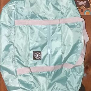 Mint Green Backpack with Pink Accents